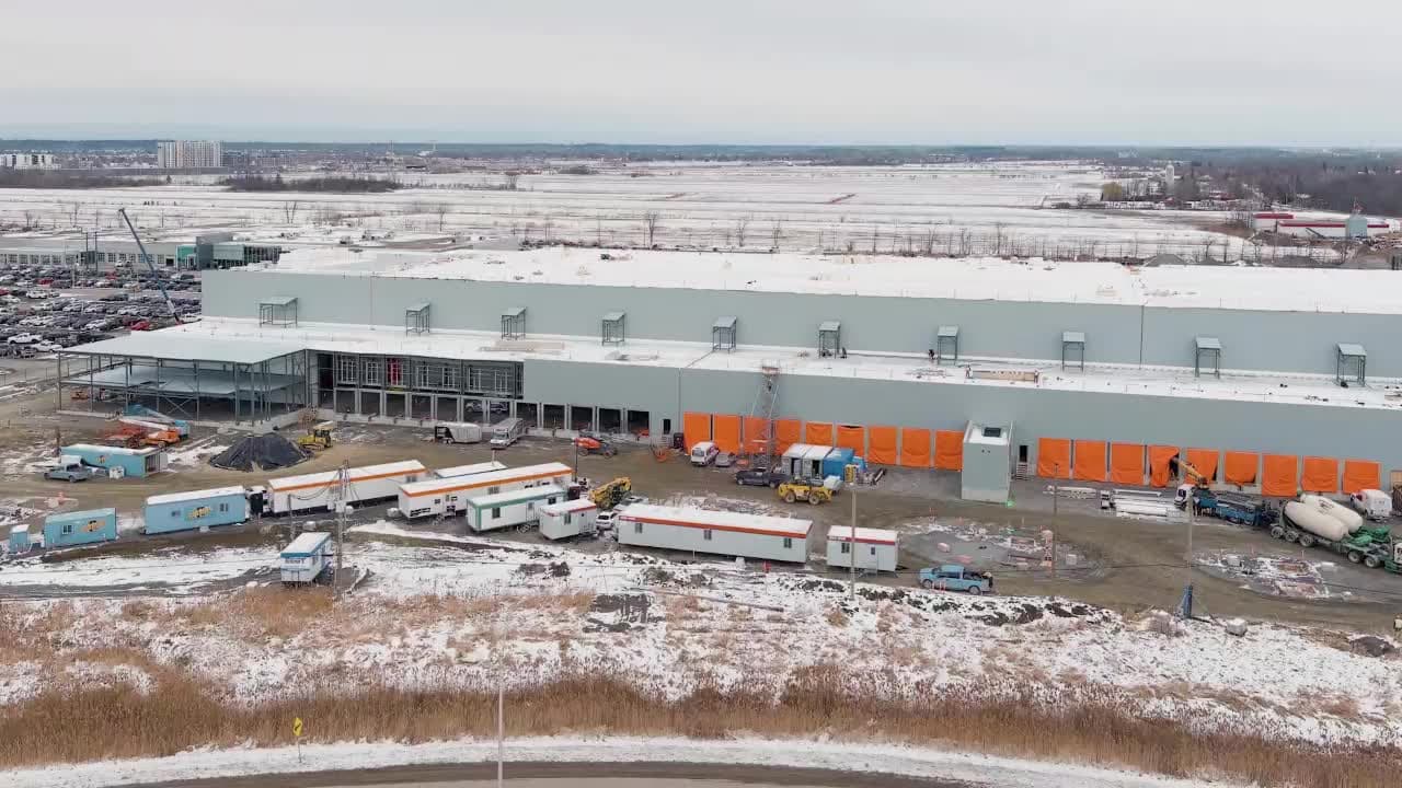 Aerial view of an Oakbank-financed construction site, with shoring and excavation underway